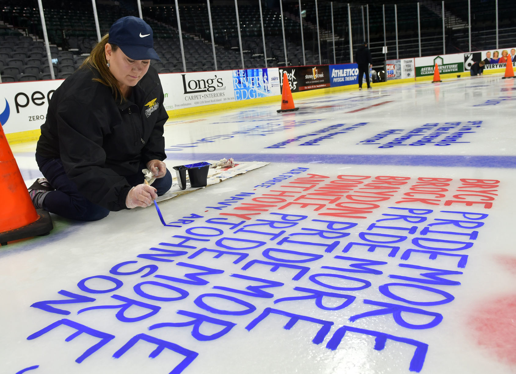 Salute To Military ice painting at the TaxSlayer Center